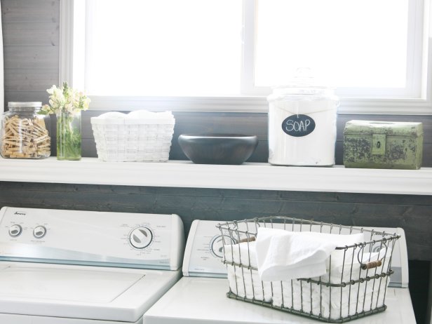 Laundry Room With Stylish Storage Containers