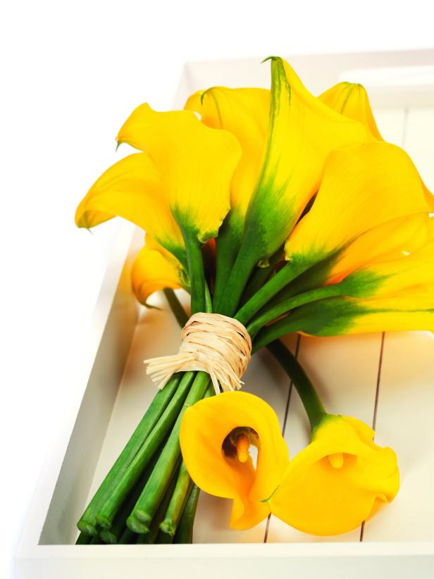 Yellow and Green Calla Lilies Wrapped With Raffia Ribbon