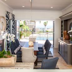 Neutral Transitional Dining Room With Pool View