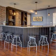 Basement Wet Bar With Exposed Red Brick Wall