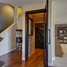 Basement Wine Cellar With Exposed Red Brick Walls