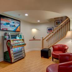 Stairway and Jukebox in Colorful Basement