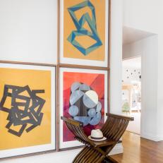 Atypical Art Arrangement Creates Attention-Grabbing Display in Hallway