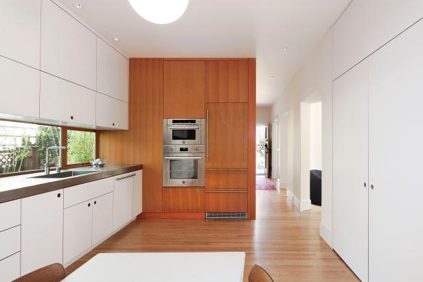 Bright Modern Kitchen With White Laminate Cabinets Vertical