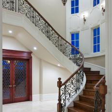 Opulent Foyer with Curving Staircase