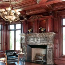 Traditional Living Space with Paneled Walls, Marble Fireplace
