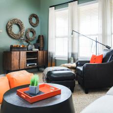 Teal Contemporary Living Room With Black Leather Armchair