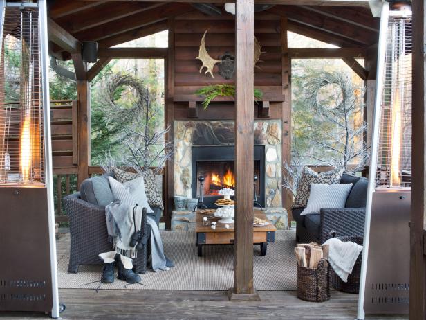 A combination of classic prints mixed with warm, wintry solid fabrics keeps this outdoor living room cozy during the holidays and throughout the winter. If youâ  re looking for a timeless, less is more look, consider mixing neutrals like gray, charcoal and tan with organic textures and tree cuttings.