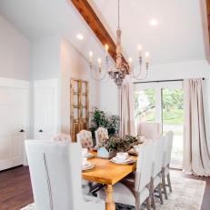 Dining Room With White Upholstered Chairs