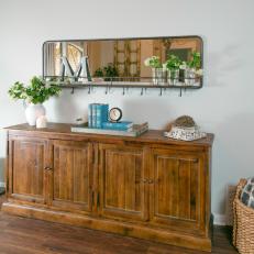 Rustic Console and Hall Mirror in Entryway of Renovated Home