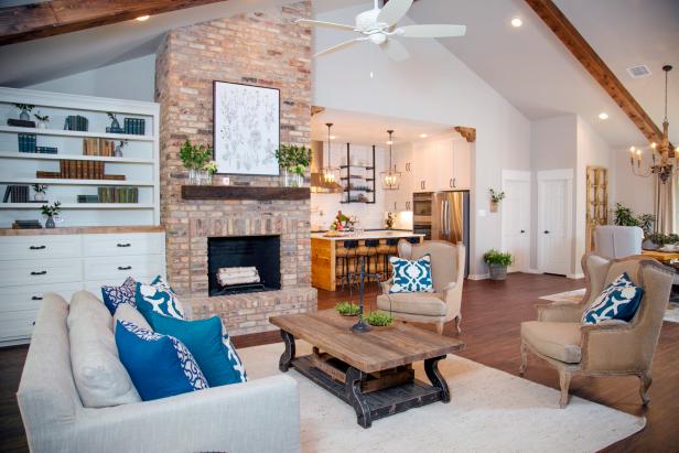 Living Room With Vaulted Ceiling And Brick Fireplace Hgtv