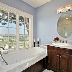 Elegant Blue Bathroom With Scenic View