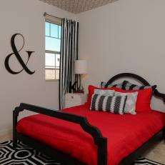 Bold Bedroom With Geometric Ceiling and Black and White Rug