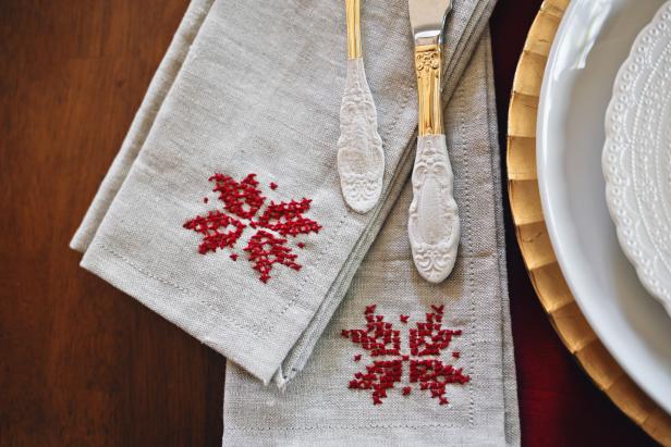 cross stitched poinsettia napkins
