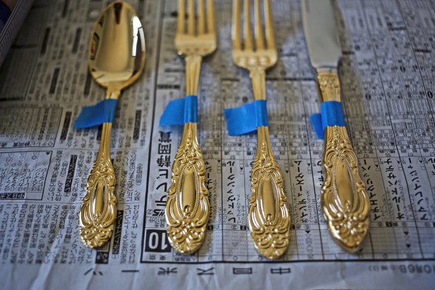 vintage flatware wrapped with painter's tape