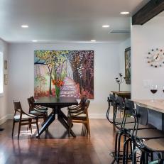 Neutral Midcentury Dining Area With Art