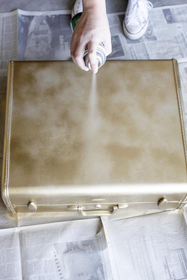 Update a dated suitcase with a few fresh coats of trendy metallic spray paint. 