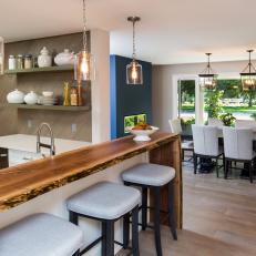 Kitchen With Walnut Bar-Top and Engineered Hardwood Floors