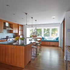 Contemporary Kitchen With Window Seat and Wood Floors