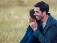 Drew Scott with his girlfriend Linda Phan around the campfire at the Bew's ranch in the foothills of the Rockies, as seen on Property Brothers at Home on the Ranch.