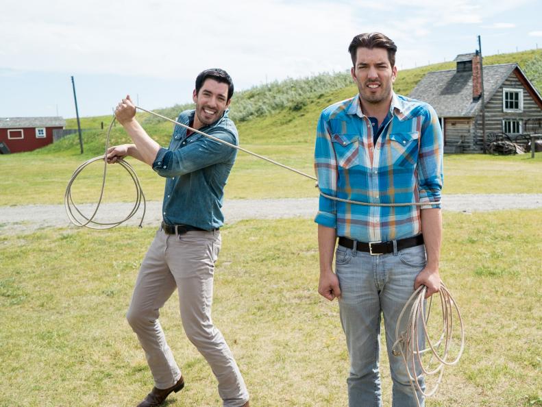 Jonathan and Drew Scott learning to rope at the Bar U Ranch Rodeo, as seen on Property Brothers at Home on the Ranch.