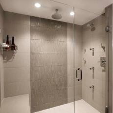 Contemporary Shower With Glass Tile Accent Wall