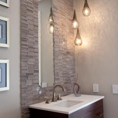 Bathroom Vanity With Stacked Stone Tile Wall