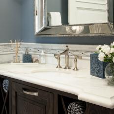 Guest Powder Room With Marble Countertop and Undermount Sink