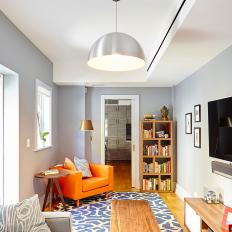 Slim Furniture, Natural Light Visually Expand Snug Family Room