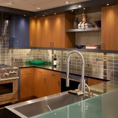 Artistic Contemporary Kitchen With Stainless Steel Backsplash