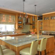 Contemporary Kitchen With Wood Cabinets and Glass Breakfast Bar