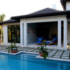 Contemporary Pool With Grid Paver Patio