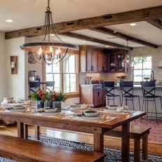 Rustic Dining Table and Bench Seating Creates Design Focal Point in Dining Room