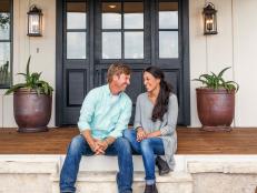 Hosts Chip and Joanna Gaines on the porch of the Zan family's newly remodeled house, as seen on Fixer Upper.