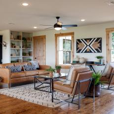 Wood Floors and Graphic Carpet Add Brightness to Living Room