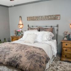 Neutral Color Palette and Elegant Accent Pieces in Master Bedroom