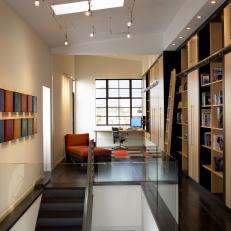 Urban Hallway Office With Built-In Bookshelves