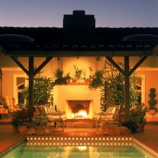Spanish-Style Home Wraps Around Pool