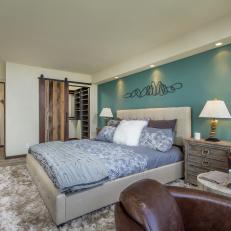 Contemporary Master Bedroom with Blue Accent Wall