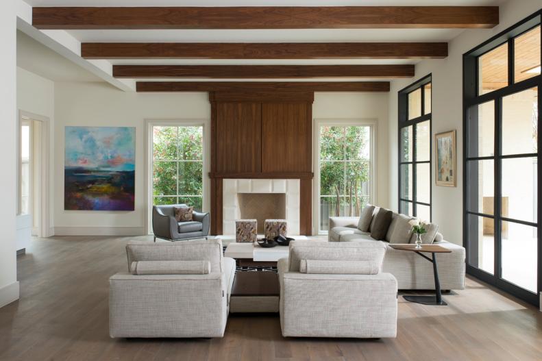 Contemporary White Living Room With Exposed Wood Ceiling Beams