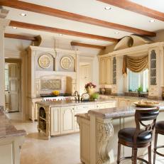 French Country-Inspired Kitchen With Exposed Wood Beams