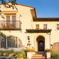 Tuscan-Inspired Home with Arched Entry