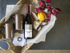 Anyone can show up with a bottle of wine. But you go the extra mile with this winning mulled wine kit for stylish holiday gift-giving.