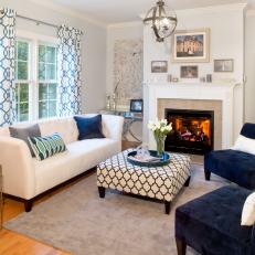 Bright Transitional Sitting Room With Deep Blue Accents
