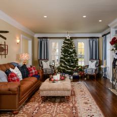Traditional Yellow Living Room Trimmed With Classic Christmas Decorations