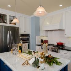 White and Blue Kitchen With Wishbone-Themed Food and Beverage Spread