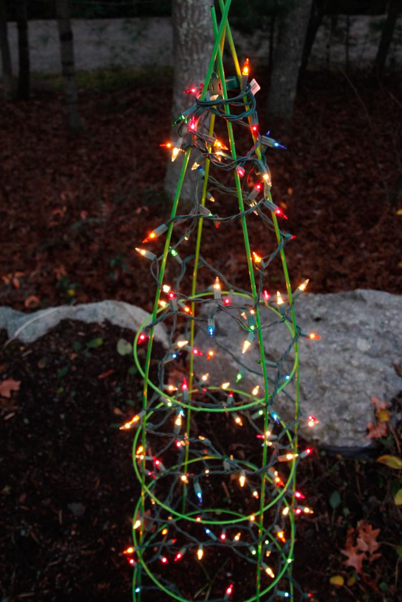 This is the ultimate vegetable gardener's holiday tree. Simply invert a tomato cage. Beginning at the top, wrap the cage with a few strings of lights and enjoy this unique take on a Christmas tree.