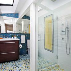 Bright Contemporary Bathroom With Textured White Wall, Blue Marble Tile Backsplash wall and Small Tile Floor 