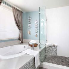 Luxe Master Bathroom Boasts Oval Tub and Walk-In Shower