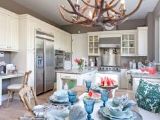 Cheery Eat-In Kitchen Features White Cabinetry